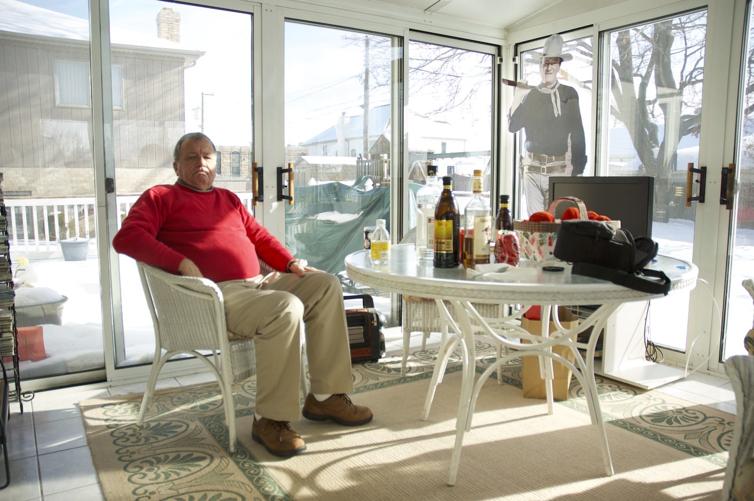 Sitting near his hero in his favorite spot. Christmas, 2008.